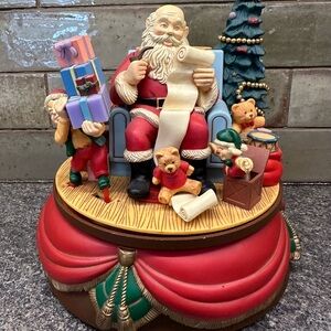Festive Santa Claus Animated Music Box Figurine with Toys